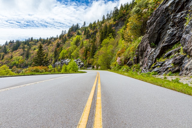 Photo of a road going through the mountains