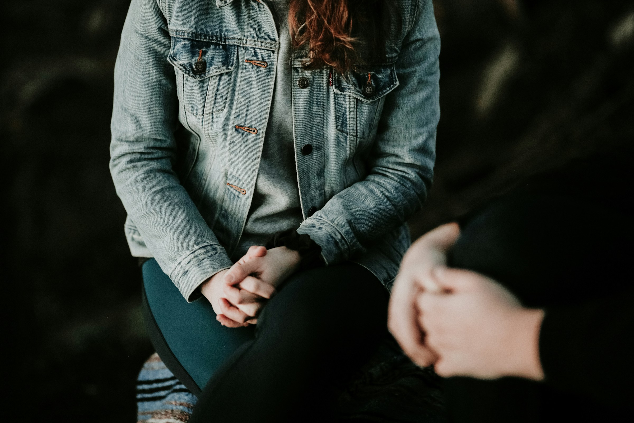 Two people sitting across from eachother.